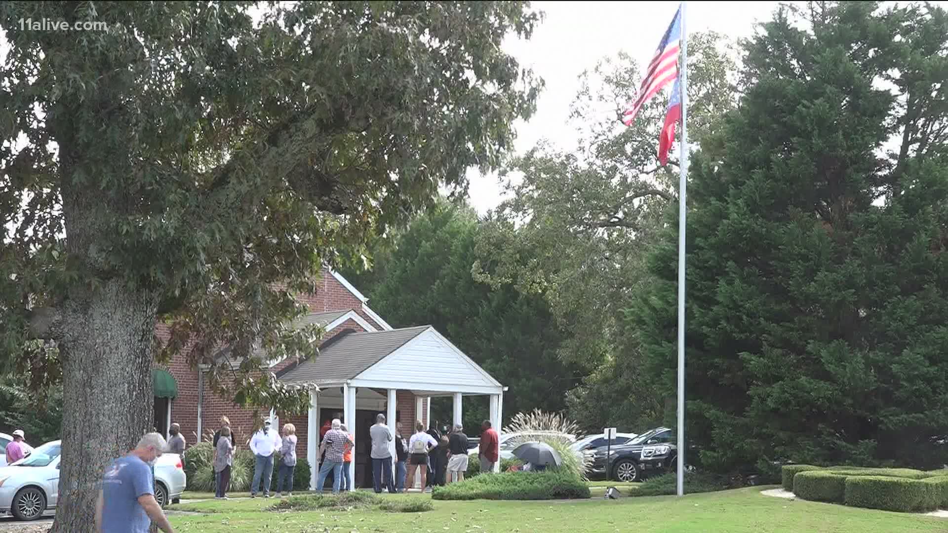 Voters said they were calling the election office for each person in line to make sure you didn't have an absentee ballot during early voting.