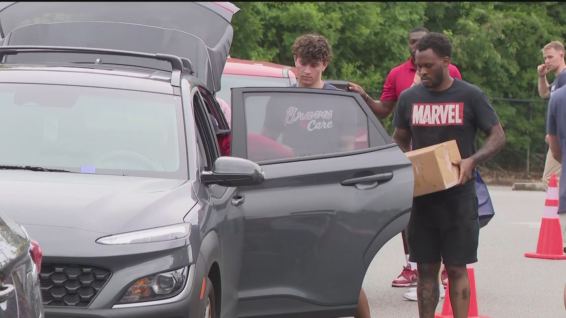 The Atlanta Braves Foundation and Chick-fil-A teamed up for an event today, giving out boxes of food to fight food insecurity in the metro Atlanta area.