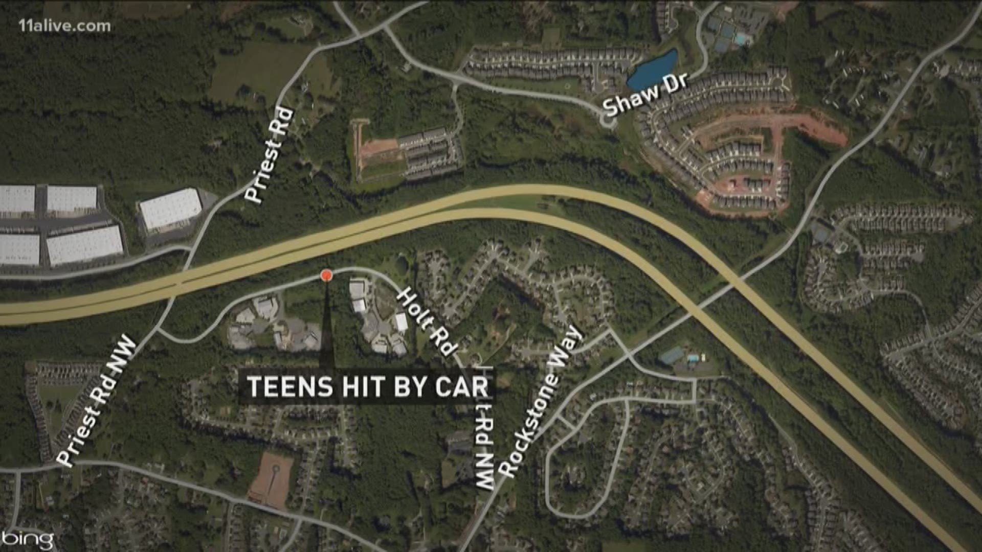 They were trying to cross Holt Road in Cobb County when they were both hit.