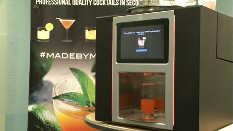 The automatic drink mixing machine -- robot bartender cocktail dispenser 