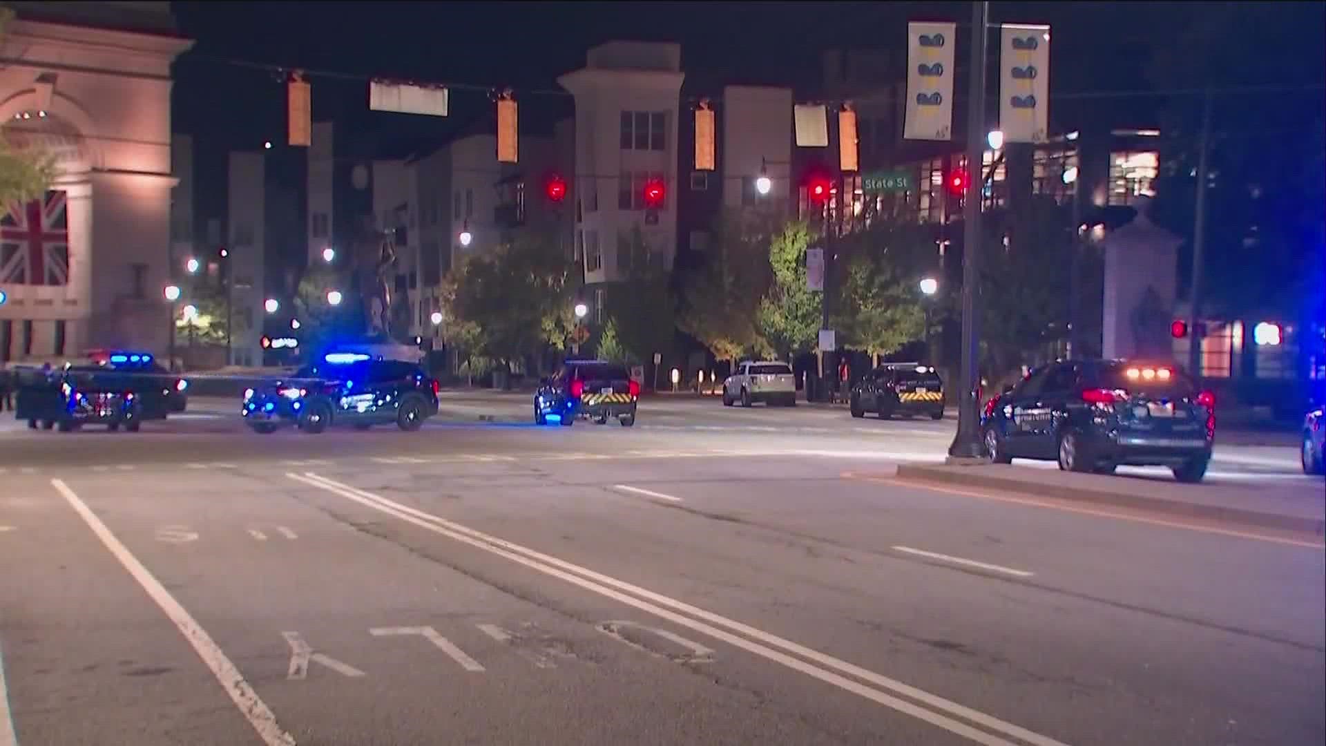 Atlanta Police are on the hunt for at least one car involved in a "gun battle" near Atlantic Station.