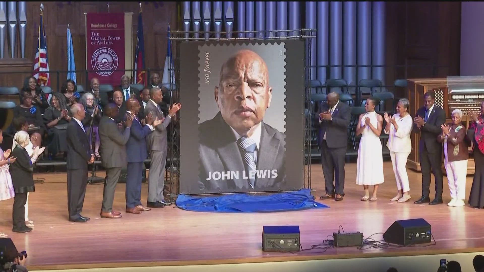 Morehouse College served as the backdrop for the unveiling of a new forever stamp from the U.S. Postal Service for John Lewis.