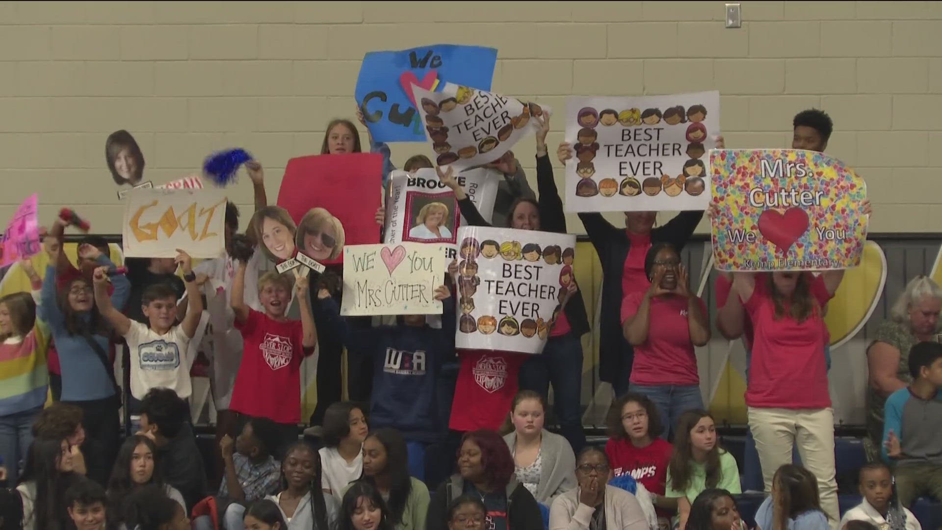 Students from Cobb County Schools and Marietta City Schools went to Wheeler High School to cheer on their favorite teacher during a pep rally.