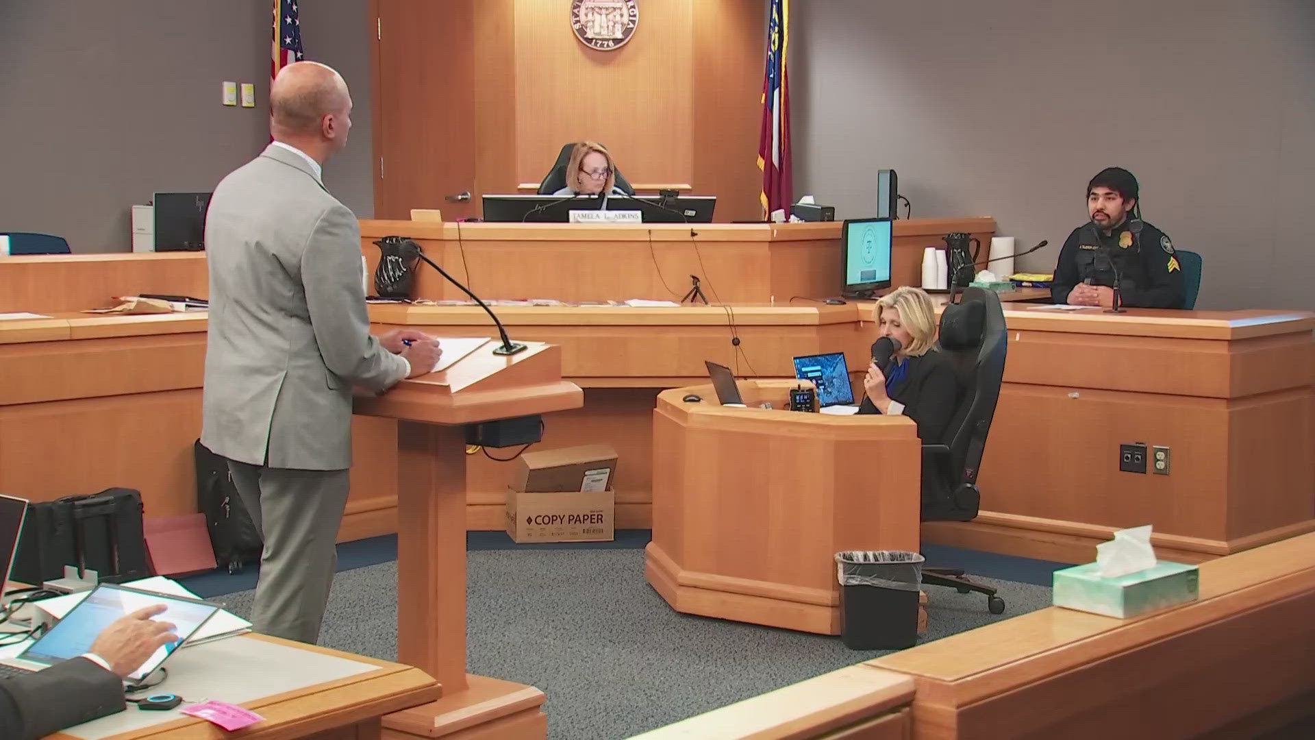 APD officer takes stand in trial for men accused in Gwinnett QuikTrip ...