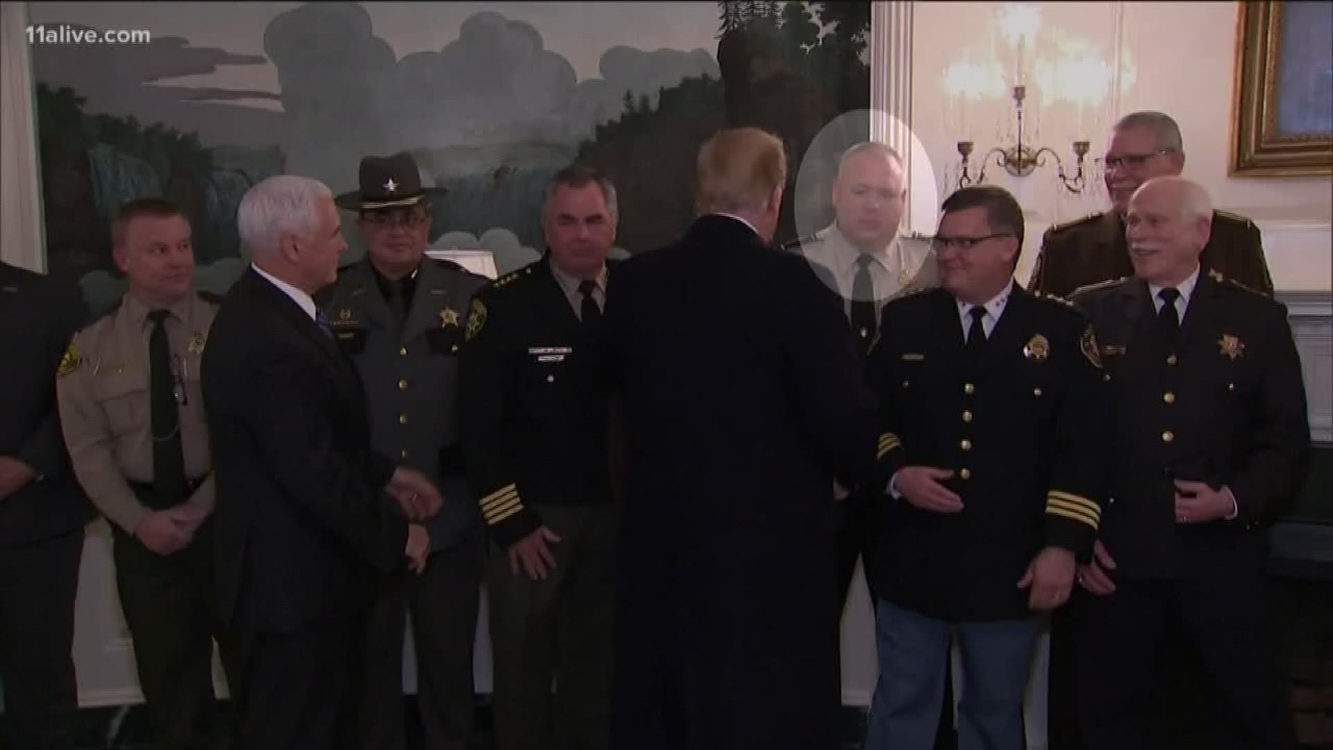 He was one of 20 sheriffs to stand with Trump during comments on Homeland Security and immigration.