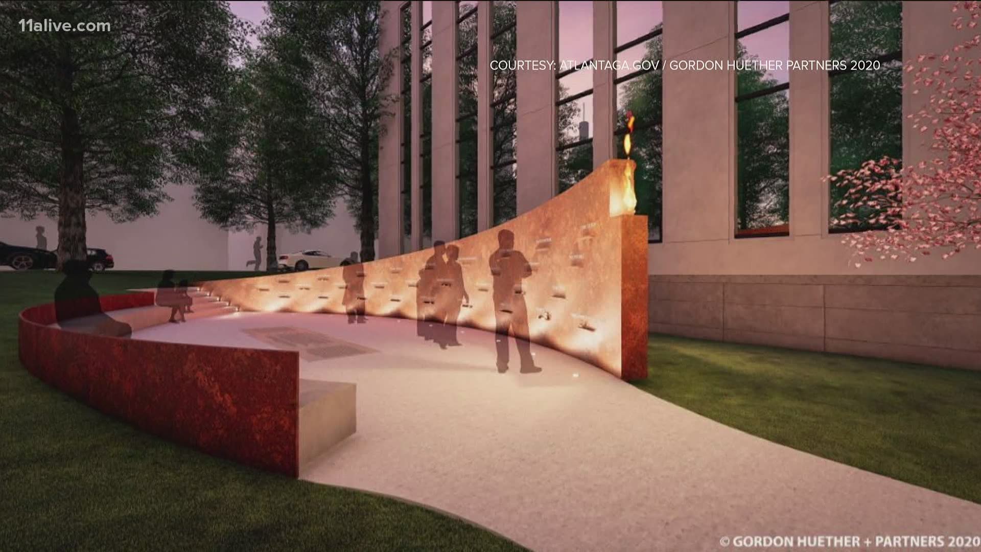 The concept is based around a sweeping steel sculpture with an eternal flame at one end.