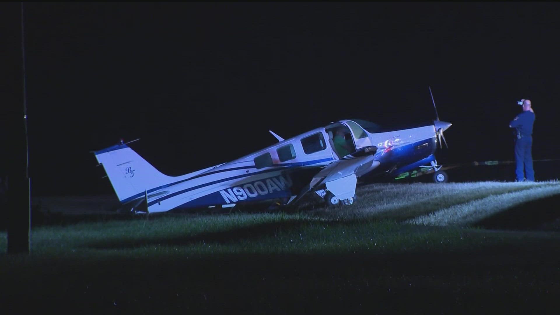 Two people are safe after an airplane made an emergency landing on a Covington highway Thursday evening, a spokesperson with the Federal Aviation Administration said