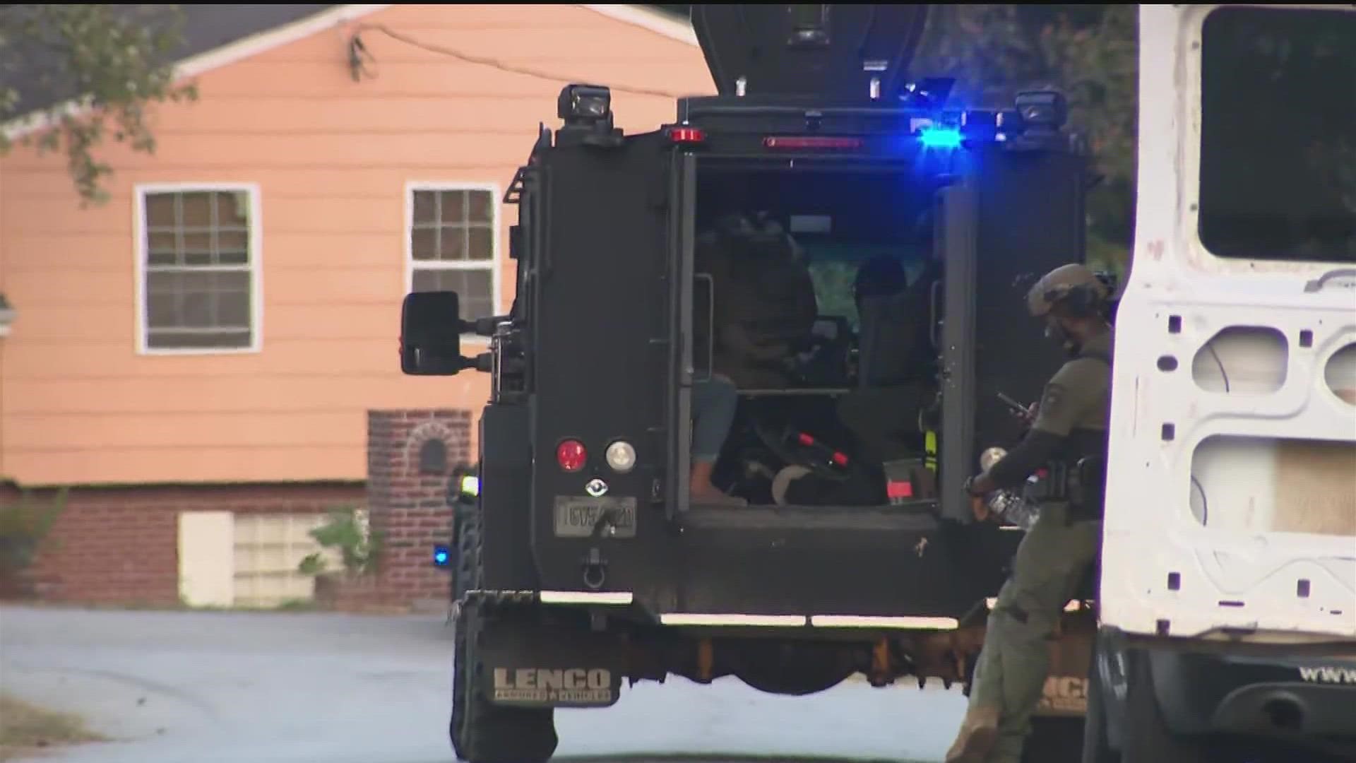 Two young girls were rescued and a 40-year-old man was taken into custody after a six-hour-long standoff in Clayton County.