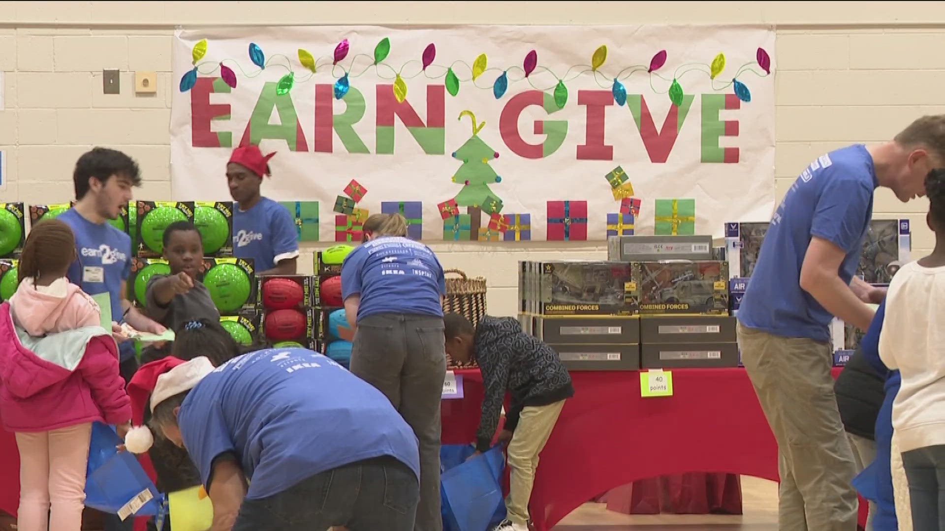 Hundreds of elementary students got to shop for their loved ones through the Earn 2 Give program.