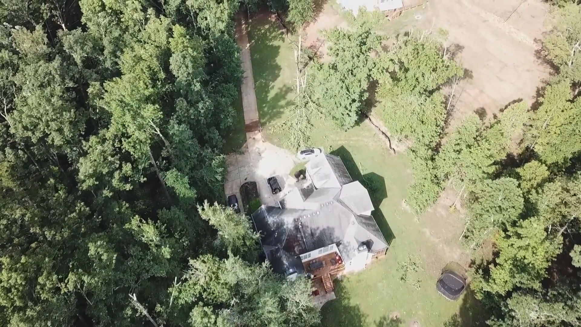 The National Weather Service is examining drone video of an area of Forsyth County to determine if a tornado or a downburst caused damage to homes and trees in that part of the metro area early Saturday morning.