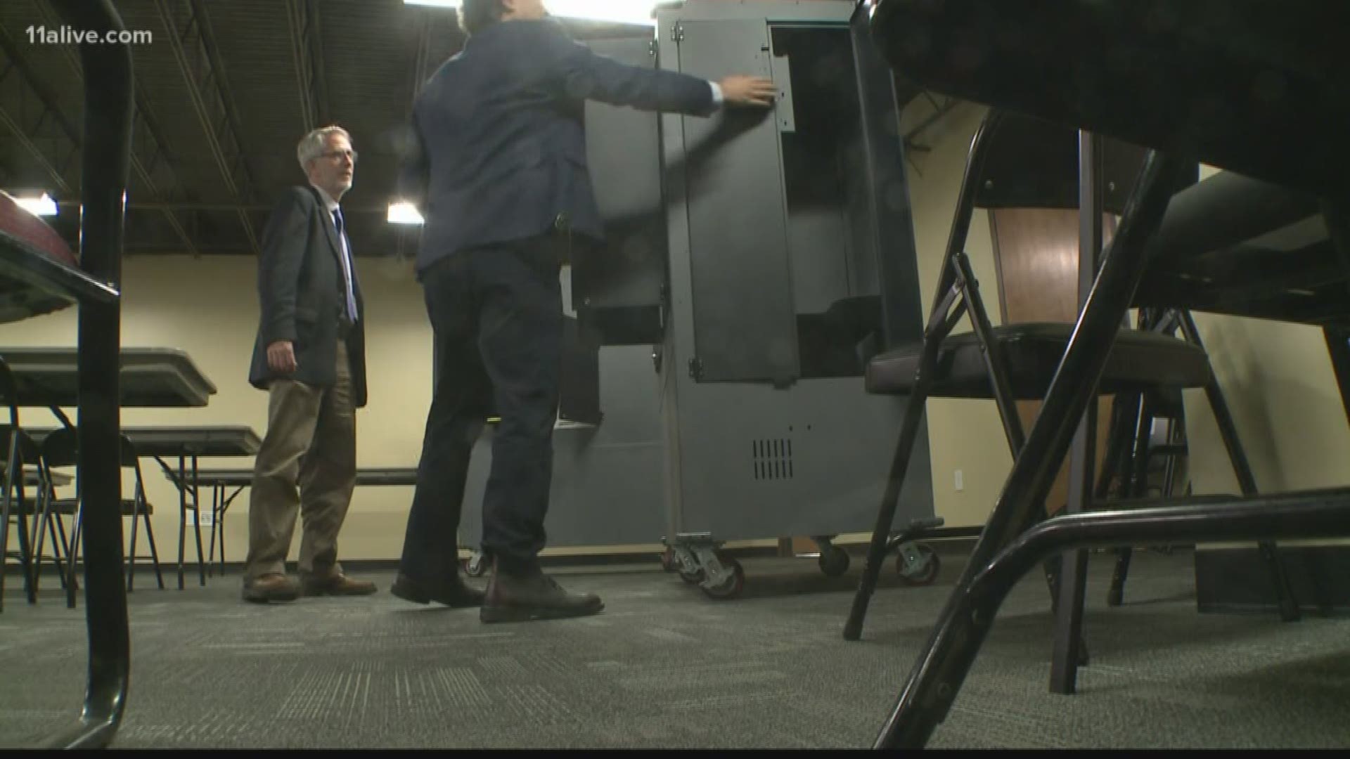 Many voters will see the new machines inside large metal cabinets purchased by Fulton County. 
The question is whether a hacker could make mischief inside one