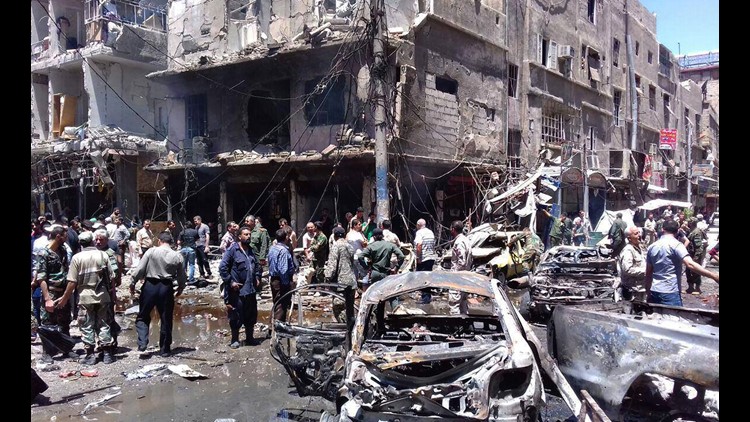 At least 8 dead in suicide bombings in Damascus suburb | 11alive.com