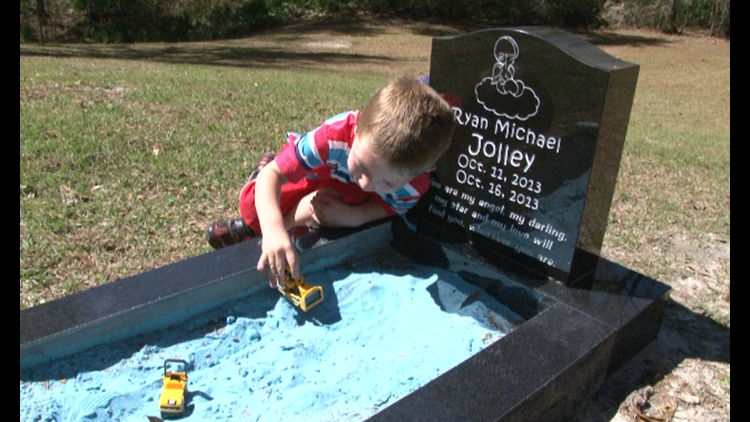 Mom adds sandbox to grave so brothers can still play | 11alive.com