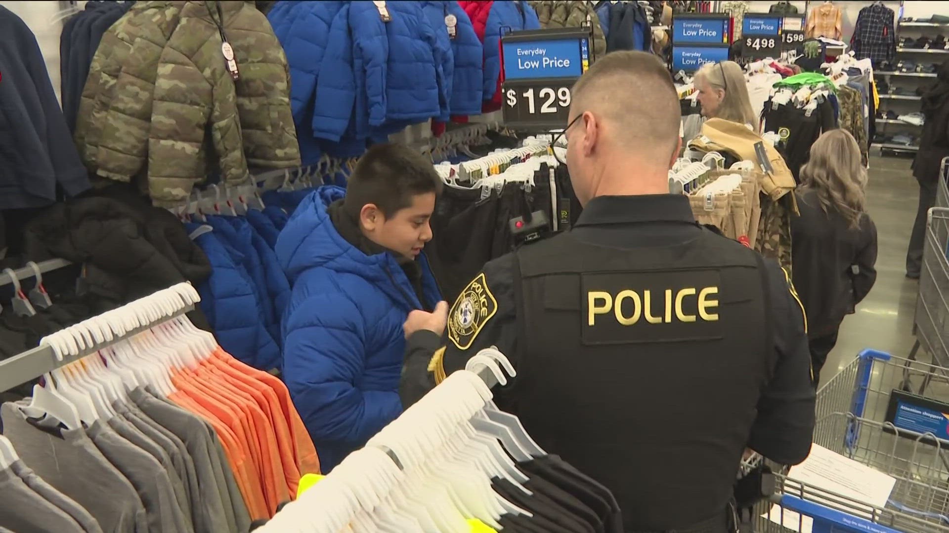 Officers were out in force at the Walmart on Cobb Parkway South to assist kids in doing a little holiday shopping.