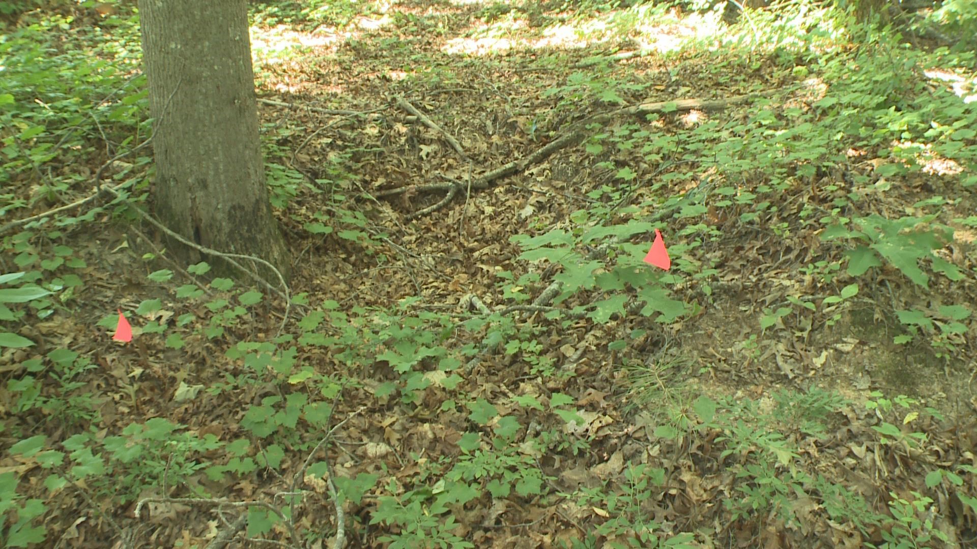 Unmarked graves found in old church grounds