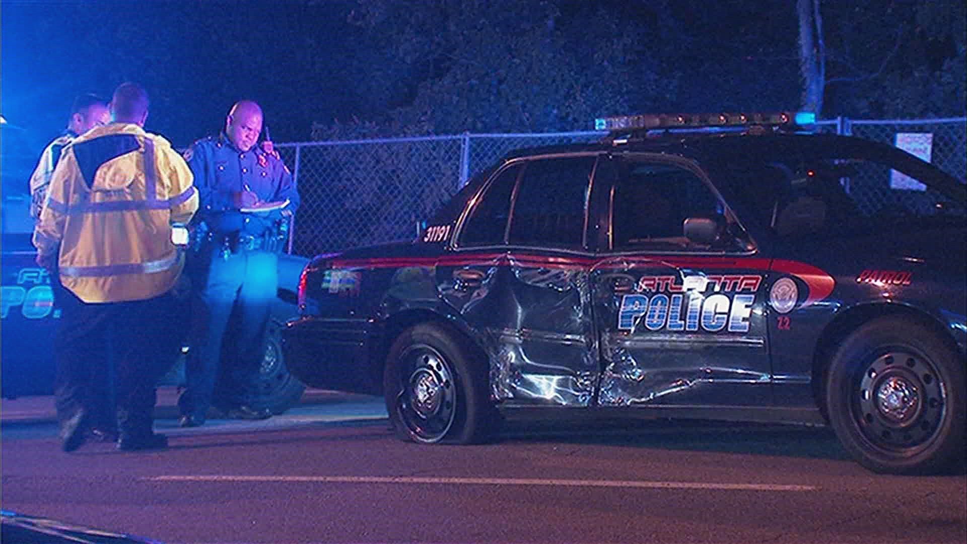 2 arrested for DUI after hitting police car | 11alive.com