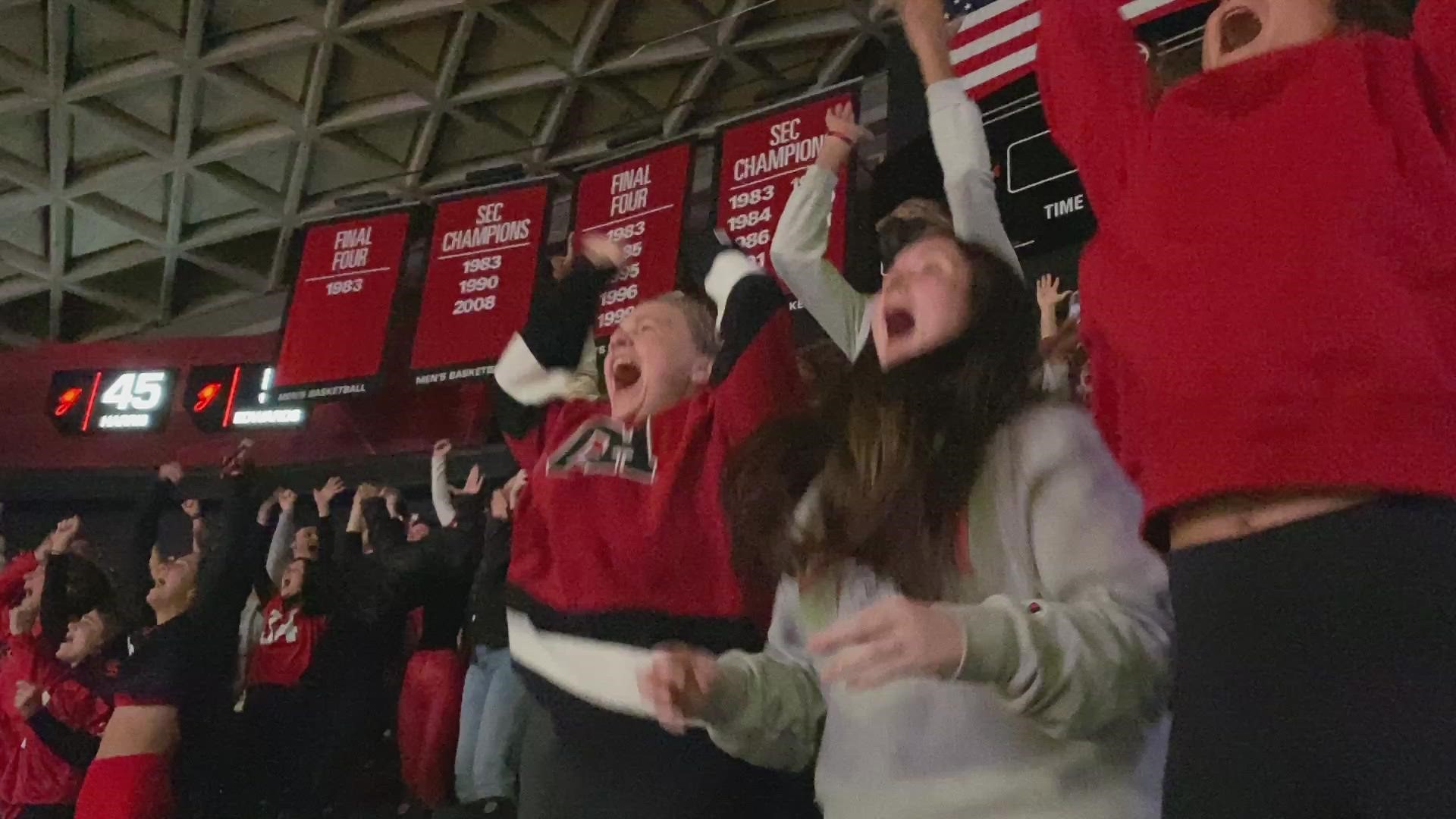 Students gathered at UGA's Stegeman Coliseum erupted into cheers watching the Bulldogs play in the SEC National Championship.