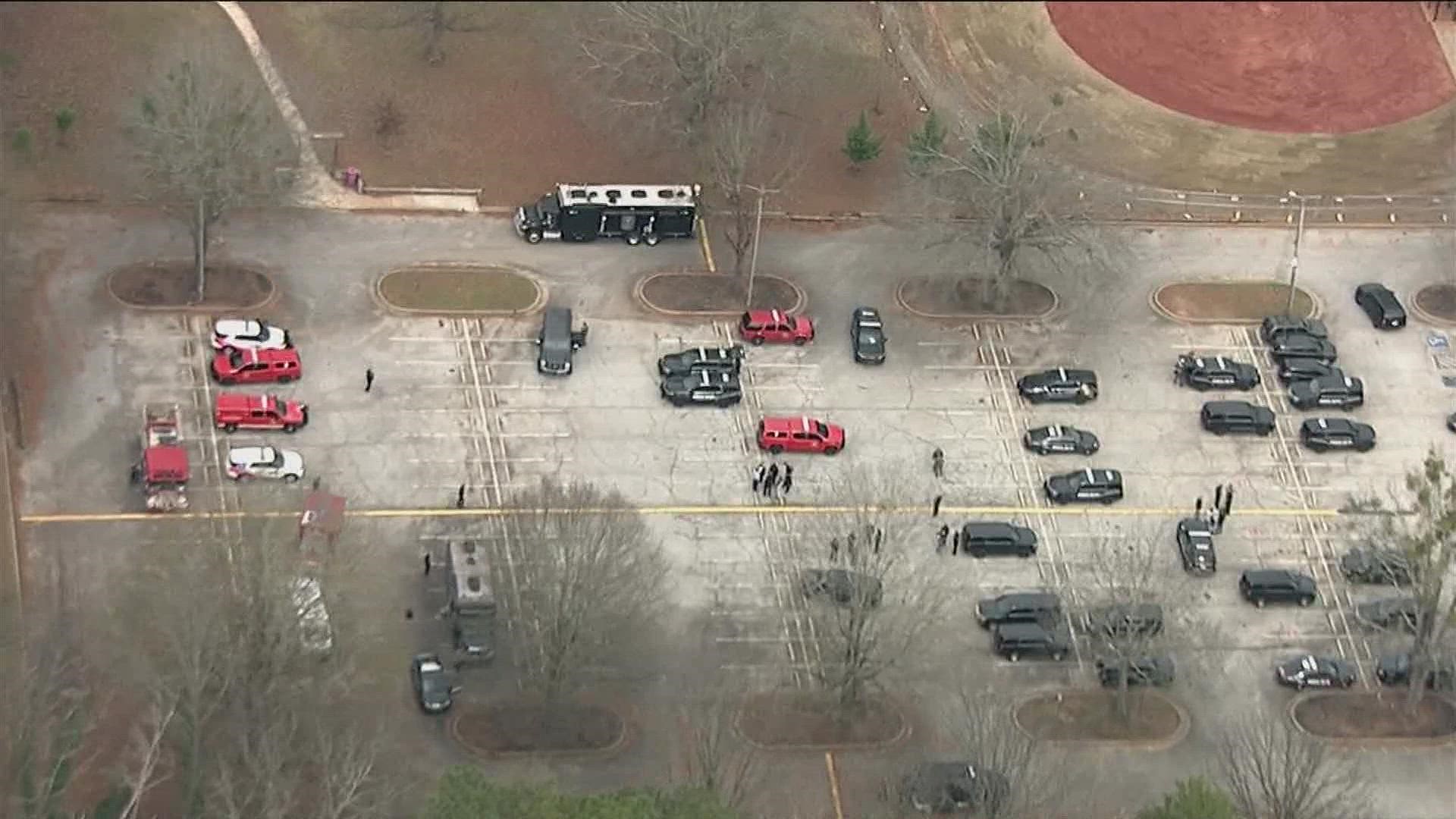 The Georgia Bureau of Investigation confirmed it was one of the responding agencies, and the 11Alive Sky Tracker flew over the site and observed APD on scene.
