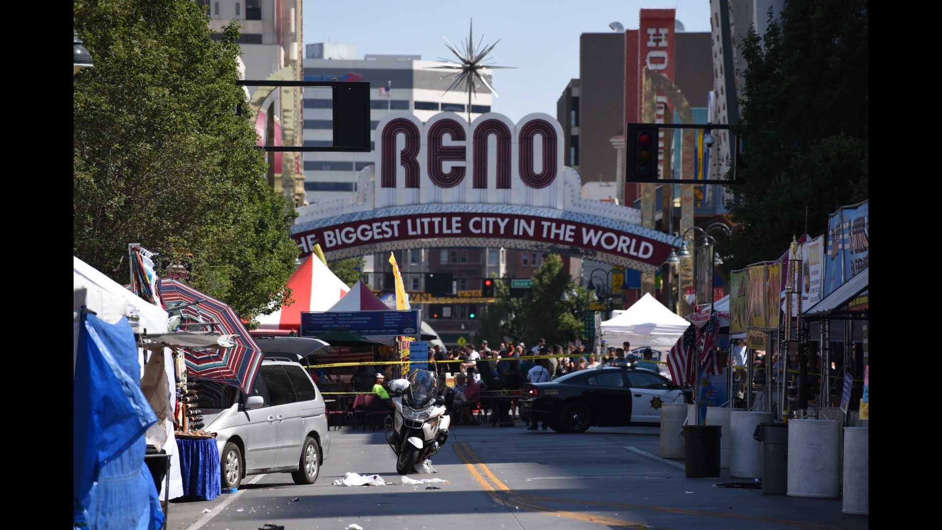 Minivan crashes into Reno Wing Fest booth, driver shot dead