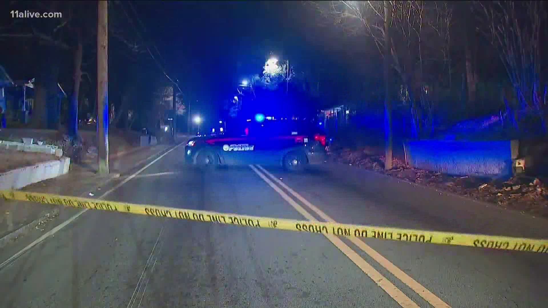 Atlanta police say people inside two vehicles were shooting at each other and three were struck