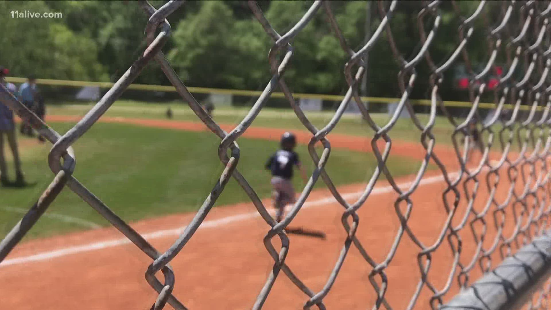 A Gwinnett County youth baseball organization is raising money by raffling an AR15 assault rifle, raising eyebrows among some Gwinnett parents.