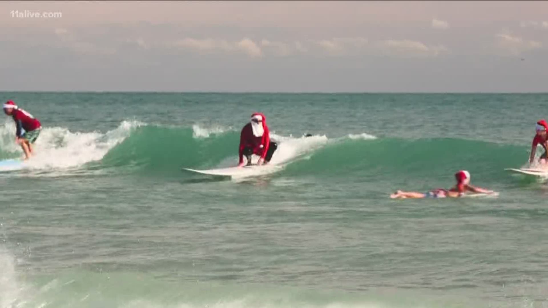 This year, this group of Surfing Santa's collected more than $60,000.