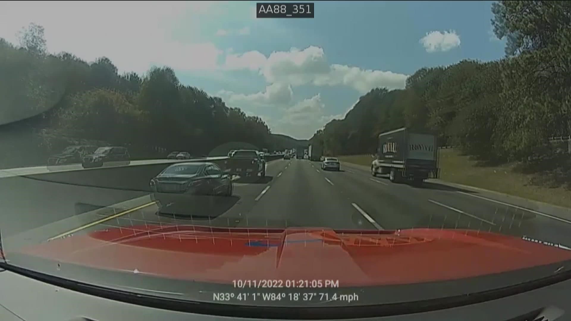 Daniel Booth was shot and killed as he was trying to exit I-285 onto I-675 in Dekalb County on Oct. 11, 2022. DKPD hopes dashcam video will generate new leads.