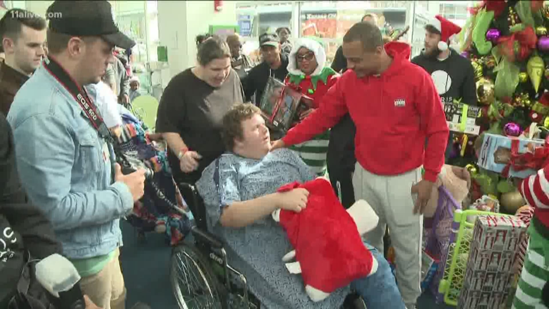 Atlanta rapper T.I. visited Children's Healthcare of Atlanta at Egelston to hand out gifts to patients.