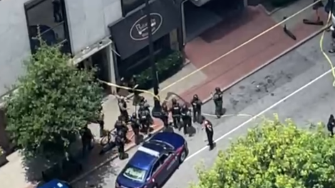 Officer shot Midtown Atlanta on Peachtree Street