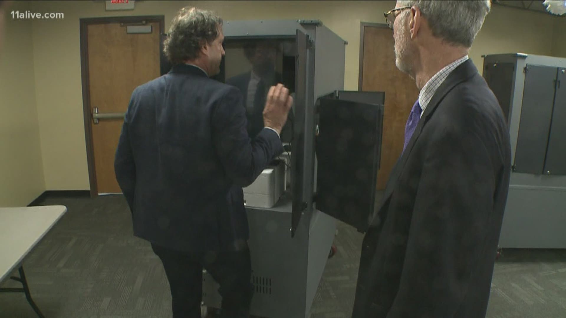 Fulton County is buying 800 metal cabinets, which will hold many of the new voting machines the state is delivering for use in next month's presidential pri