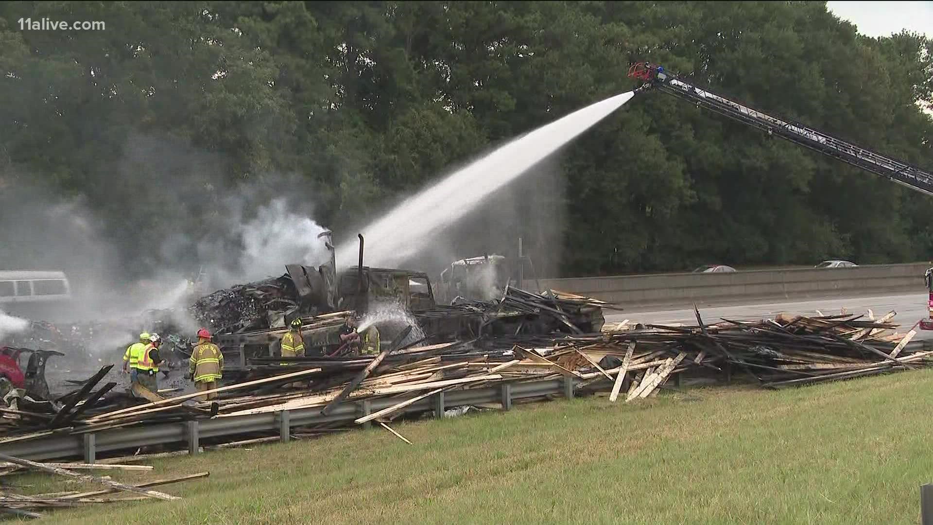 Authorities said the driver of one of the trucks was entering the interstate when it lost control.