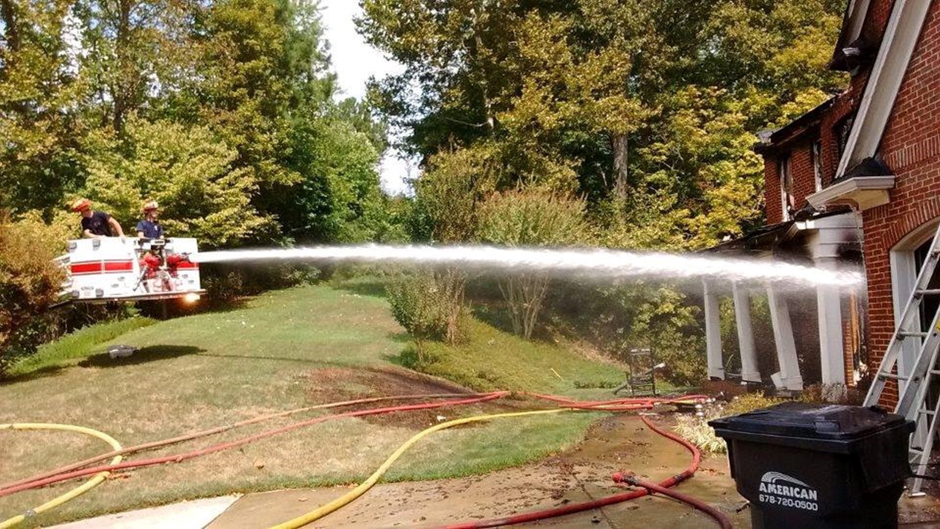 PHOTOS Crews battle house fire in Sandy Springs