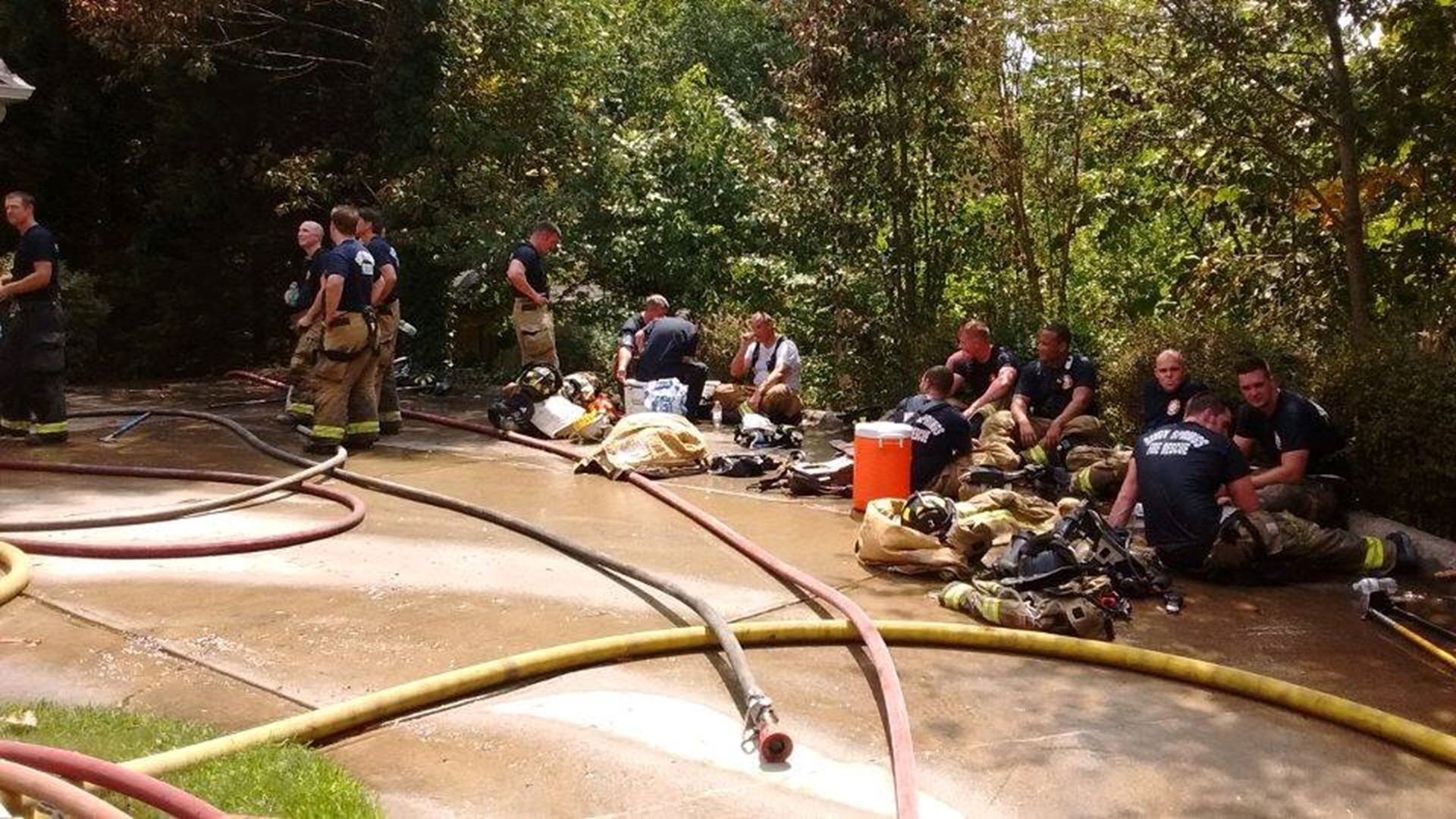 PHOTOS Crews battle house fire in Sandy Springs