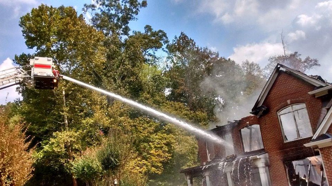 PHOTOS Crews battle house fire in Sandy Springs