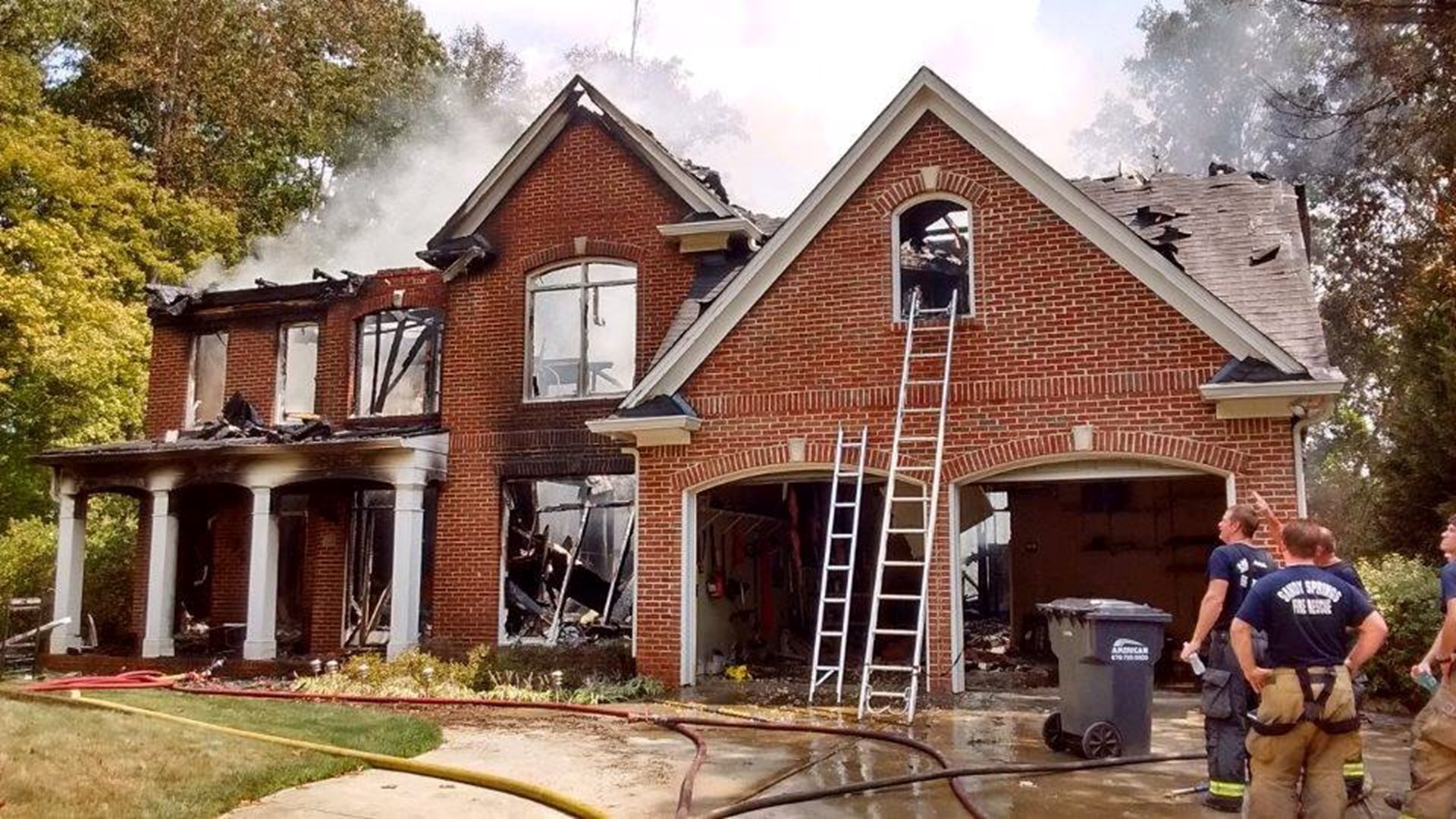 PHOTOS Crews battle house fire in Sandy Springs