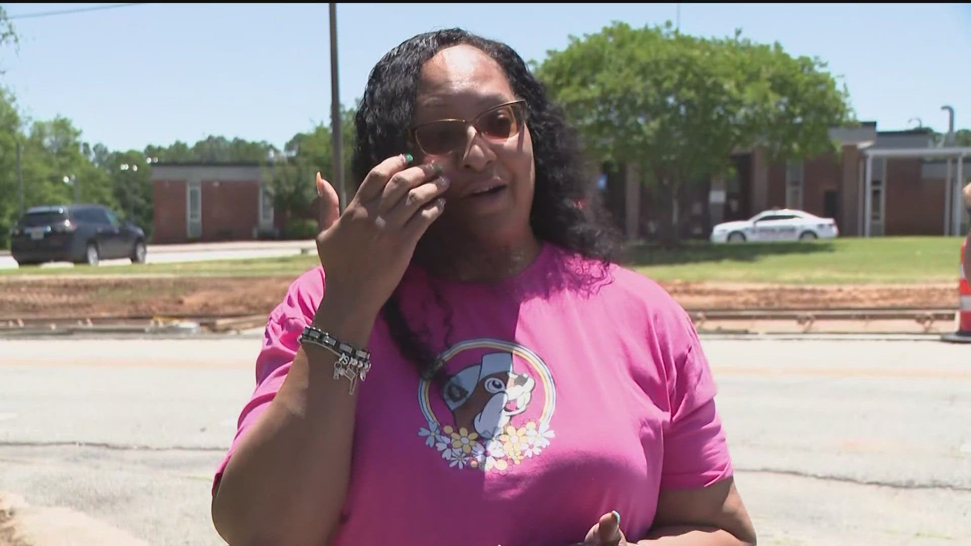 The former assistant principal at the school said she was told her pay would go through July 31 even though the school closure's date is June 30.