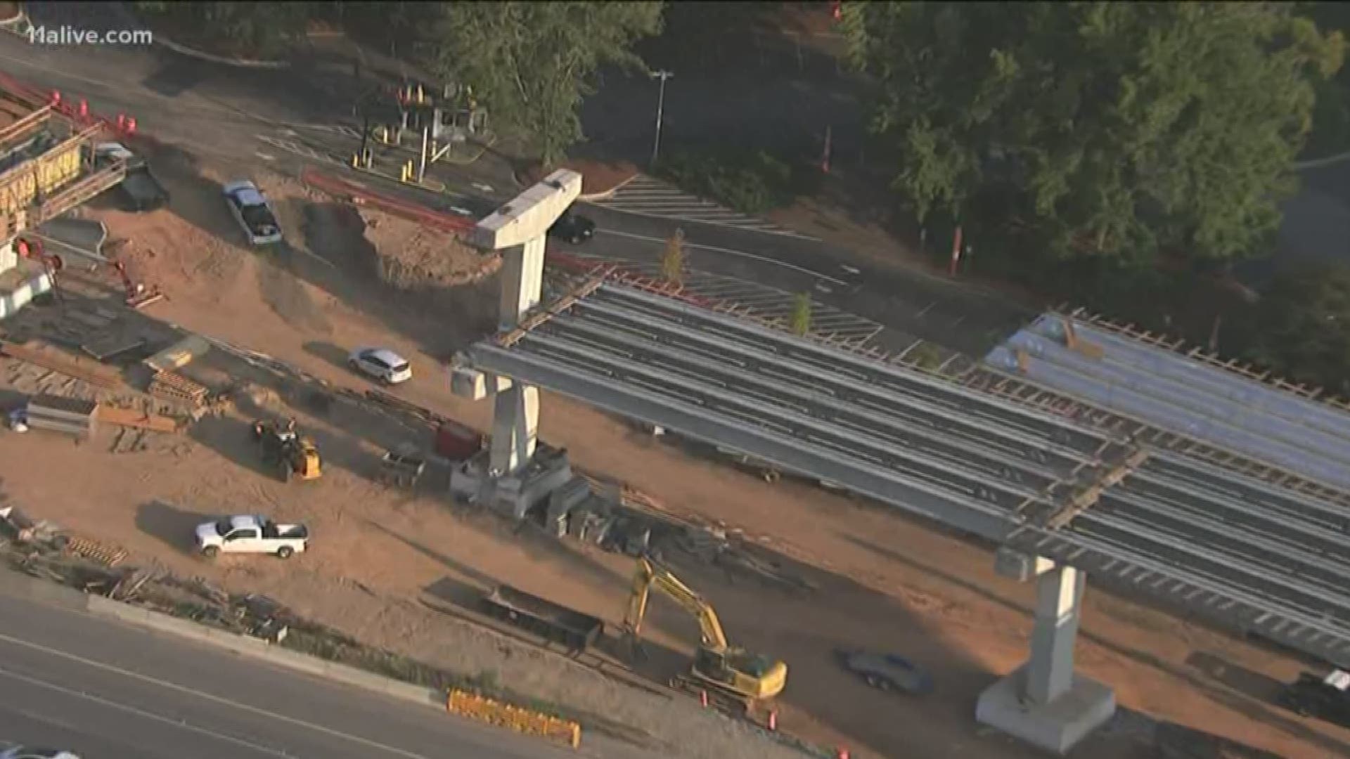 A contractor has died after a deadly incident along two of metro Atlanta's busiest roadways.