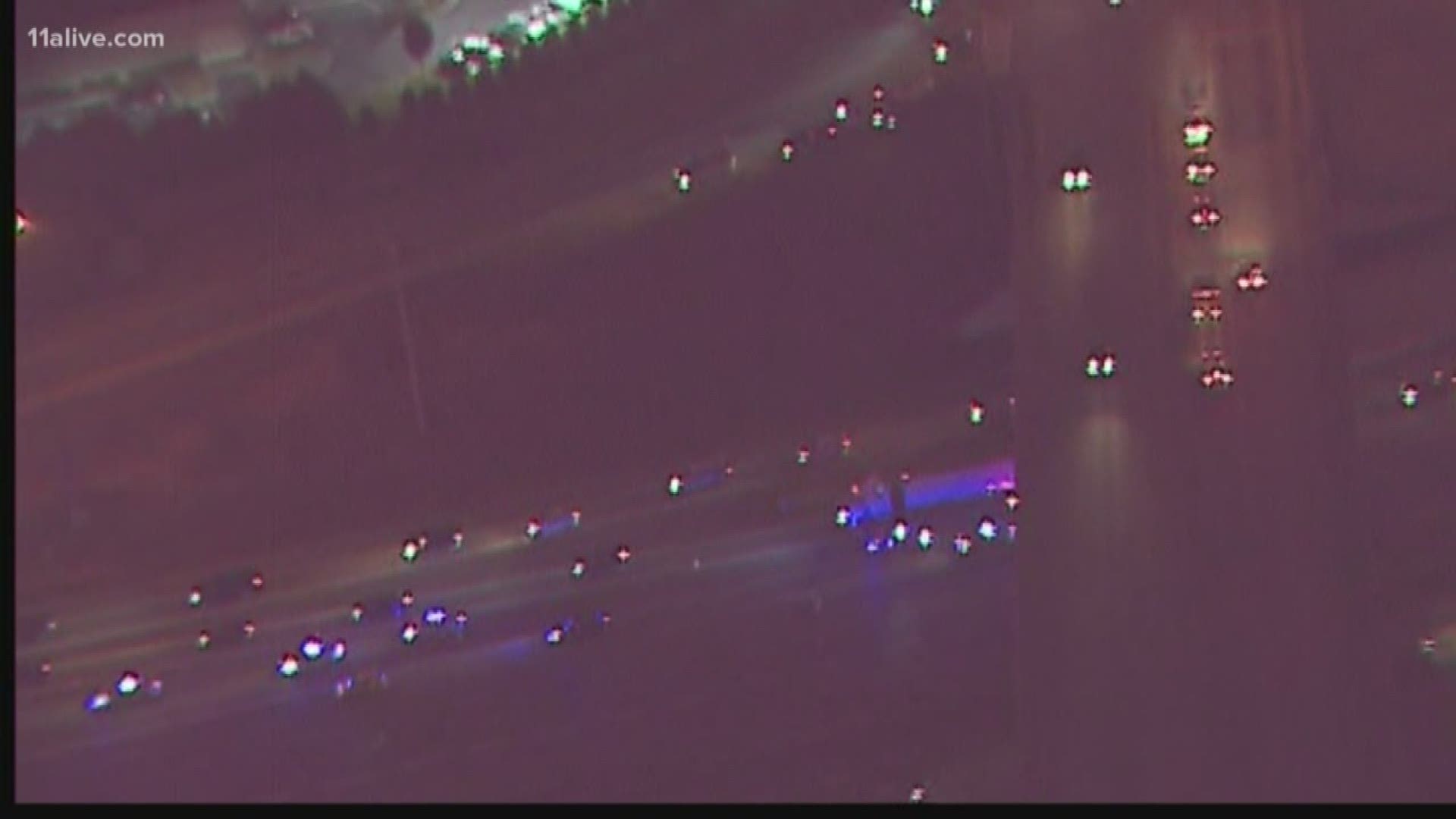 All lanes were blocked on I-85 southbound at Boggs Road after the early morning incident.