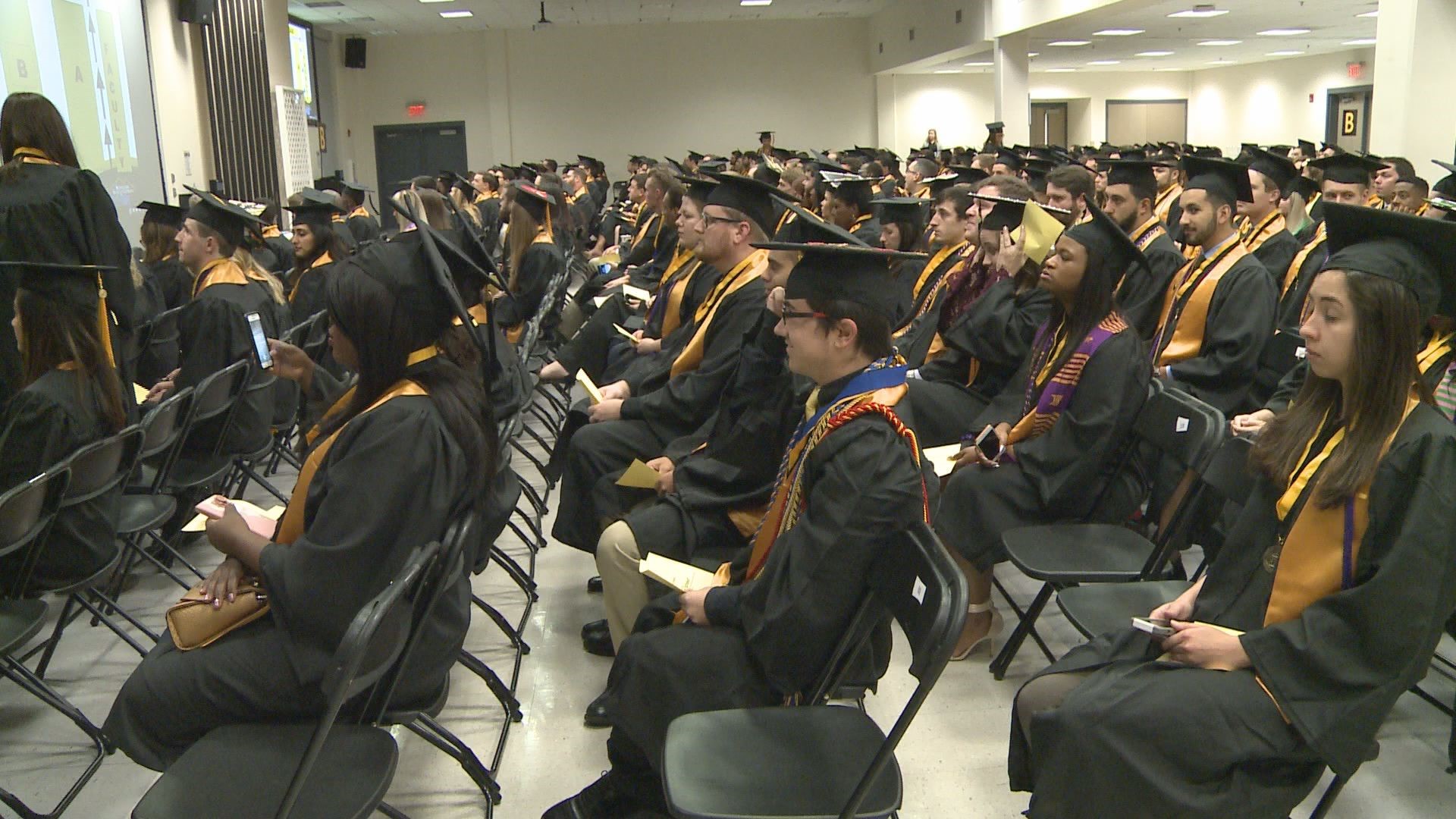 KSU graduate beats the odds and graduates with three degrees | 11alive.com