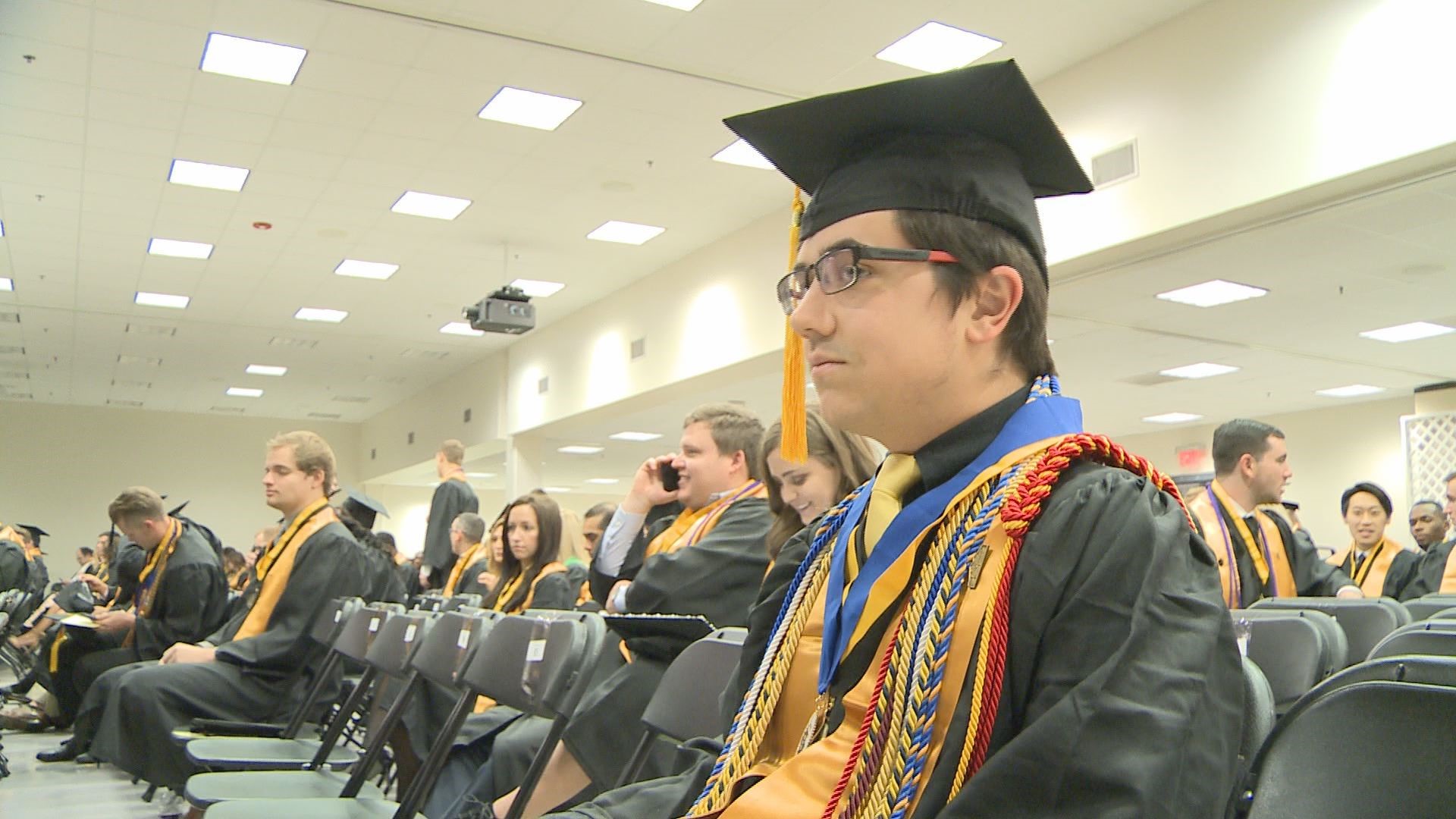 KSU graduate beats the odds and graduates with three degrees