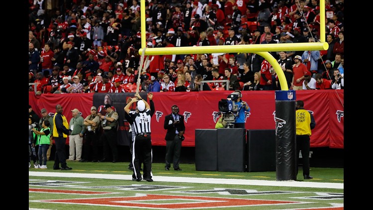 Falcons game was delayed while the refs pulled on a goal post with rope