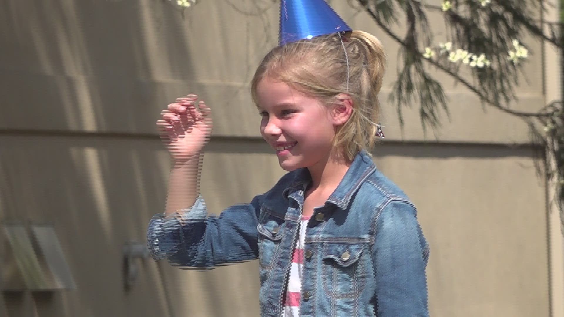 An 8-year-old girl was treated to a unique surprise party that included a parade through her neighborhood.