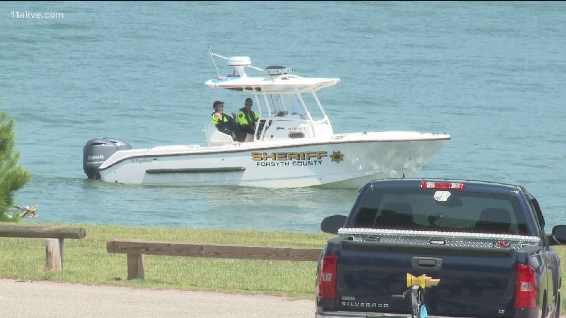 Authorities believe a generator may be to blame for killing two men and sending a third victim to the hospital after a trip out onto Lake Lanier.