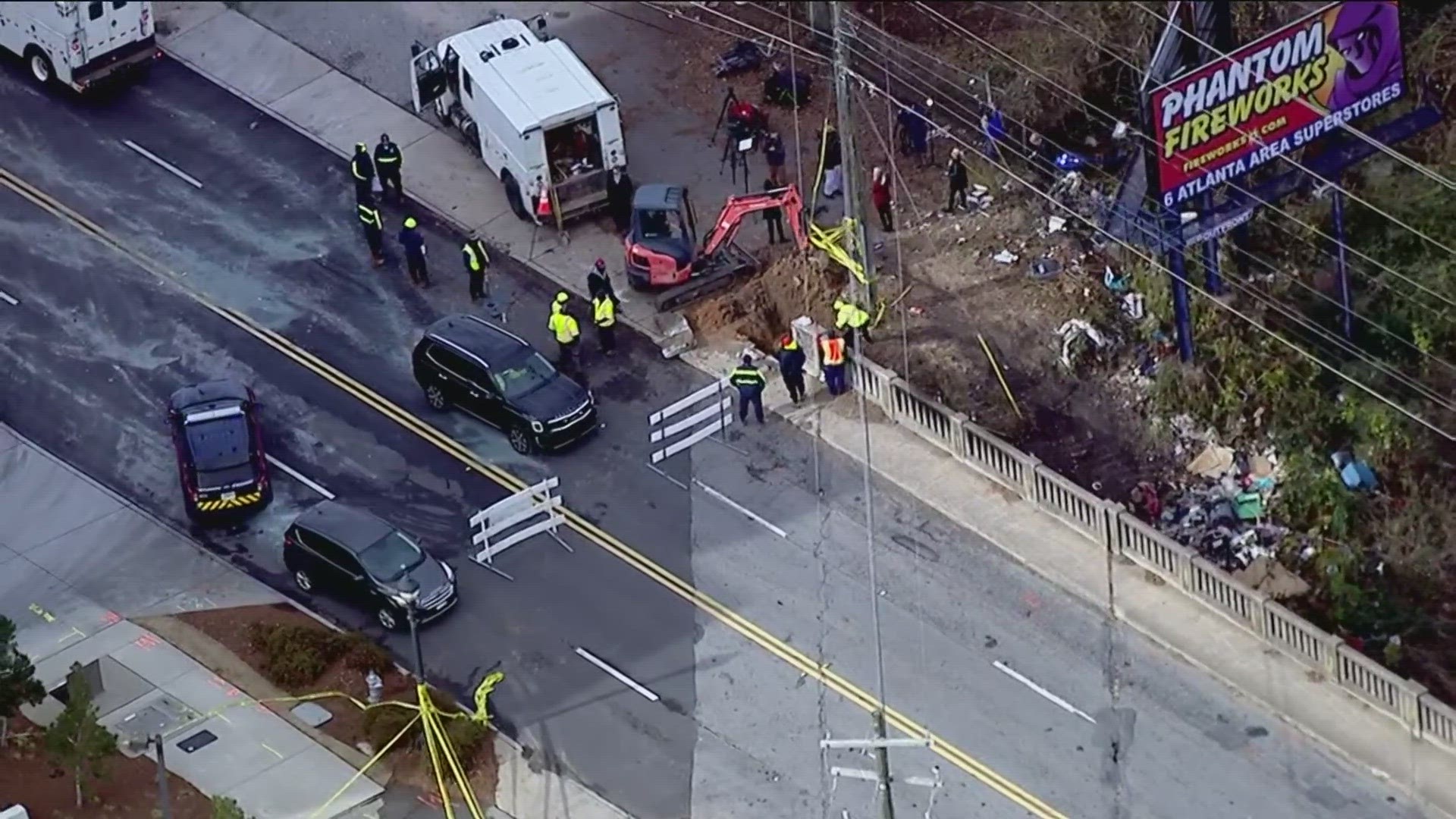 Atlanta Fire and Rescue Department said the bridge looks compromised, but officials are still determining the damage.