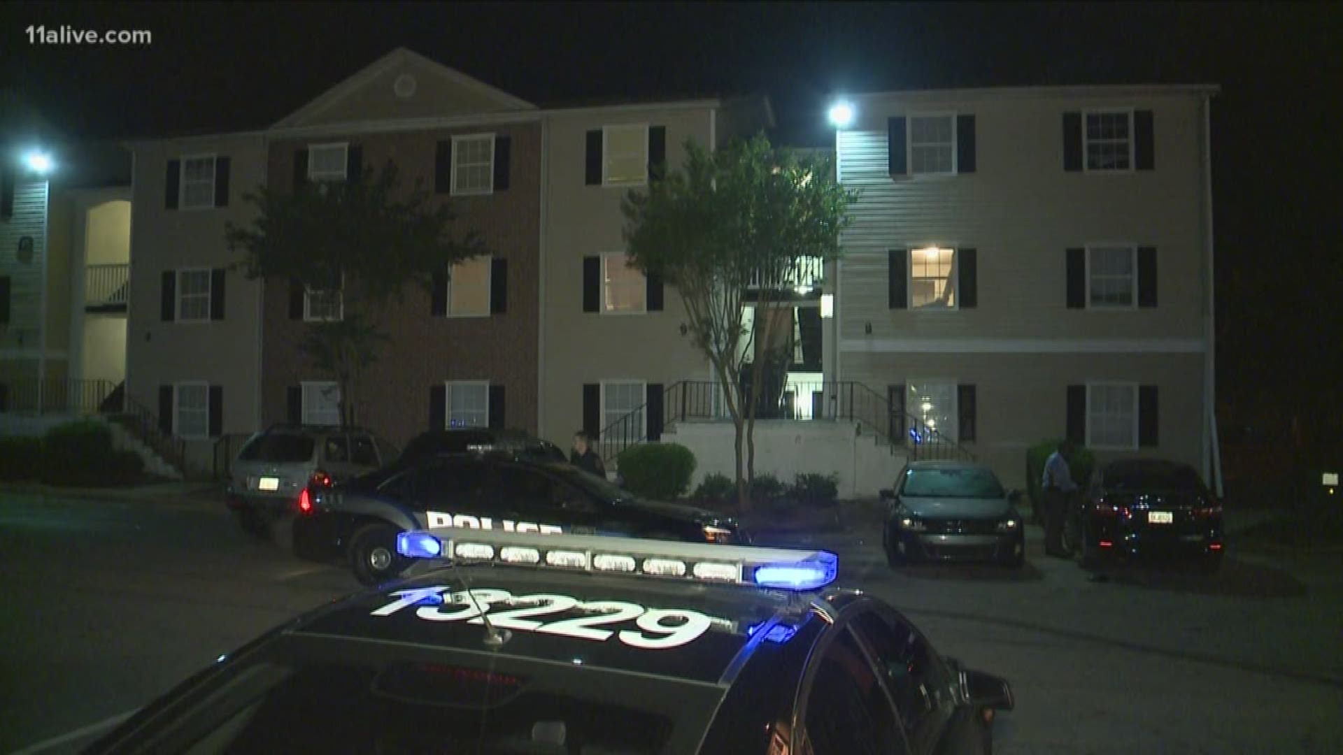 A man escaped after shooting at a DeKalb County Police Officer overnight at the Wesley Club Apartments, the department said.