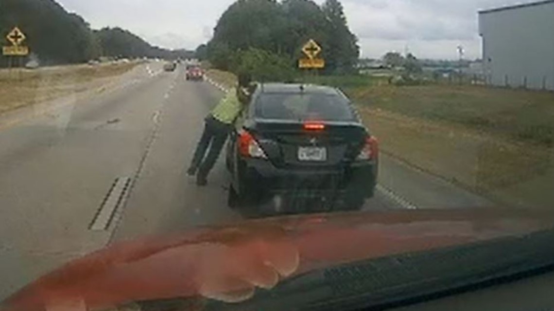 Dashcam video: Man dragged by car down road in a headlock | 11alive.com