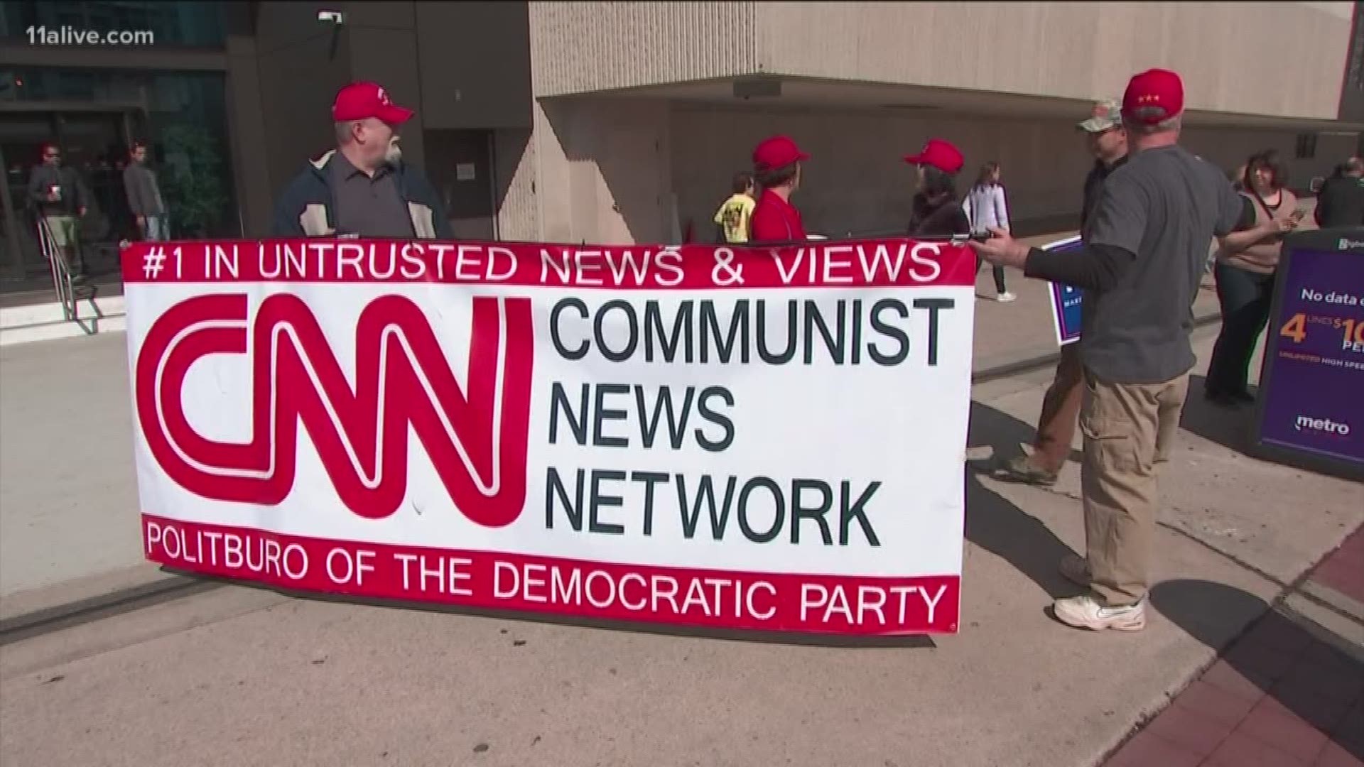 Several supporters of Donald Trump gathered outside the CNN headquarters to protest their coverage and back the president.