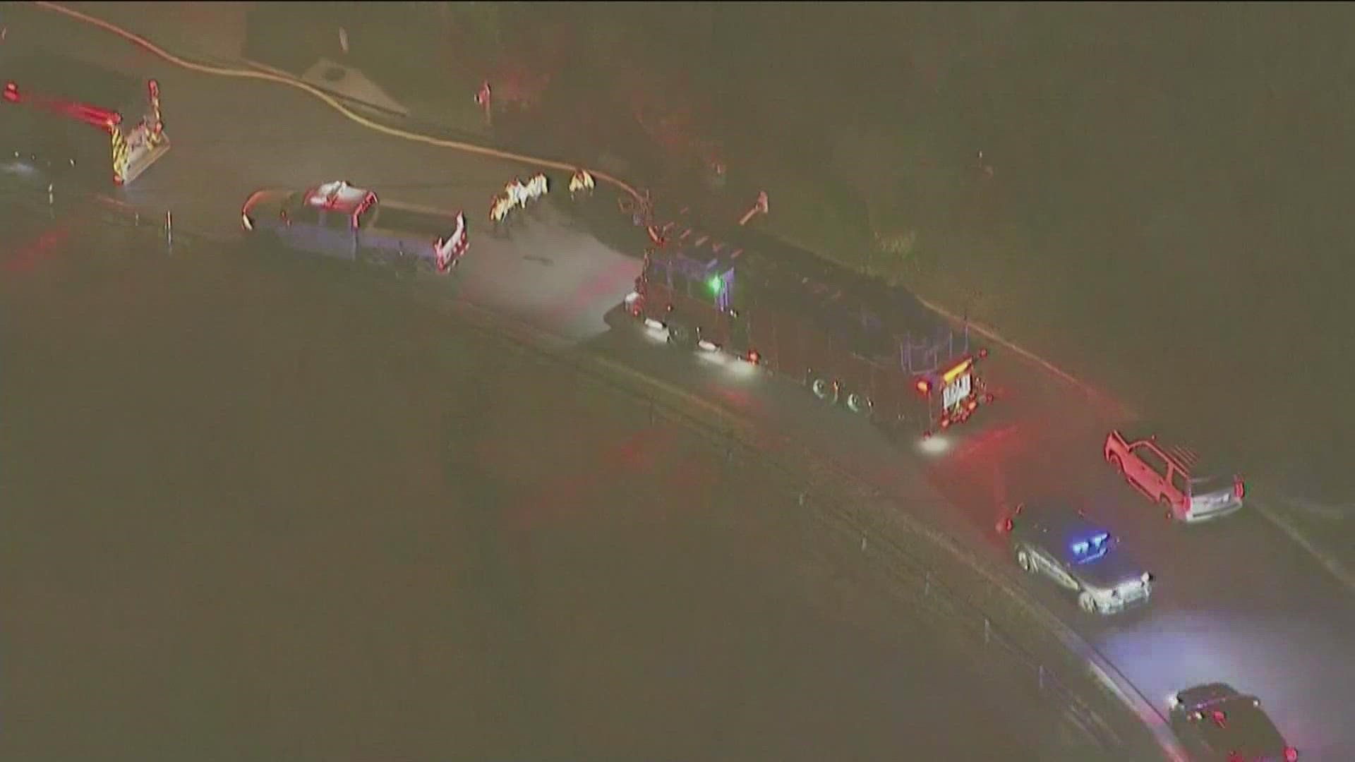 Crews battling house fire in City of South Fulton, people possibly