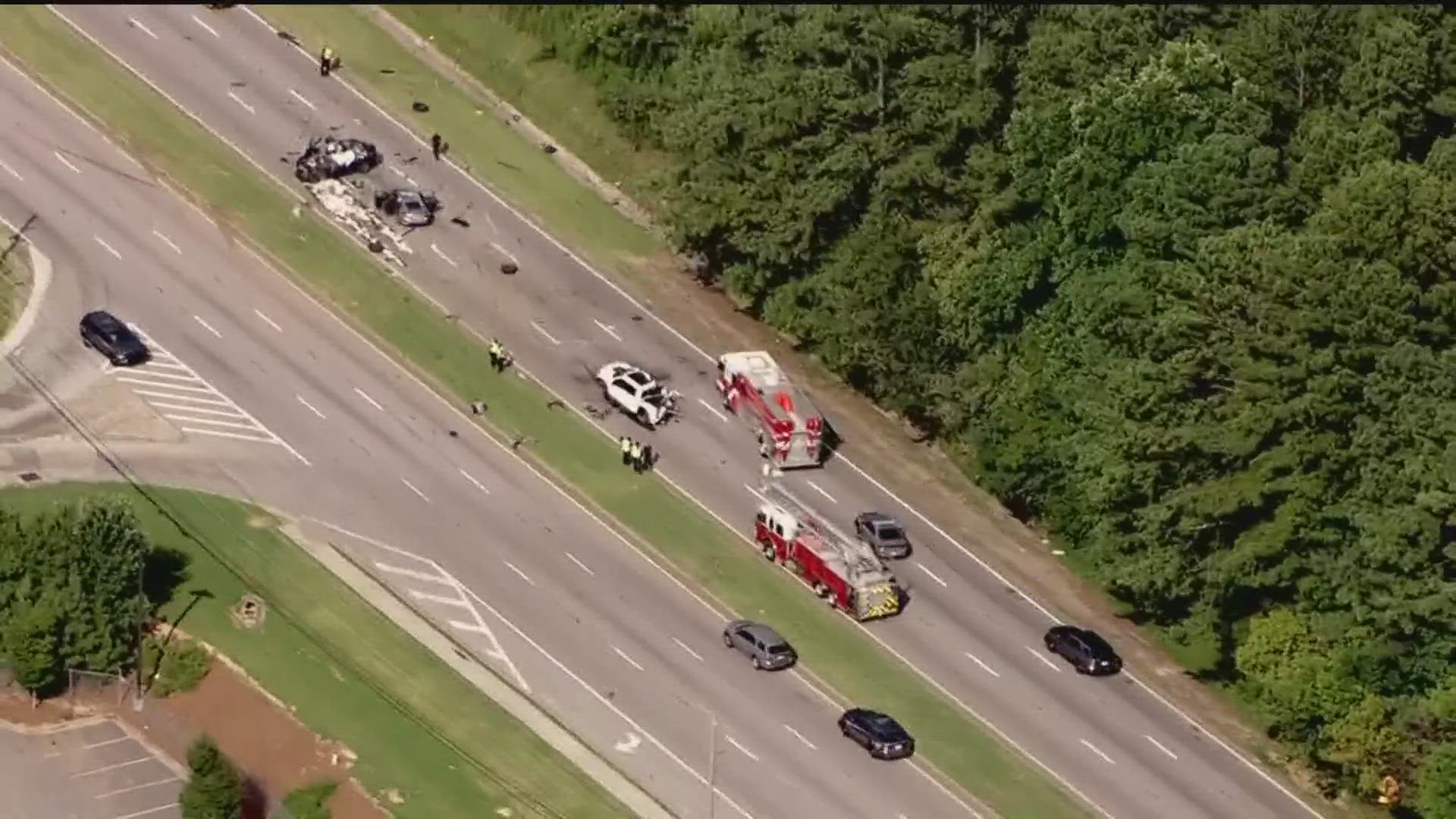 It involved four vehicles and two people died, police said. 
