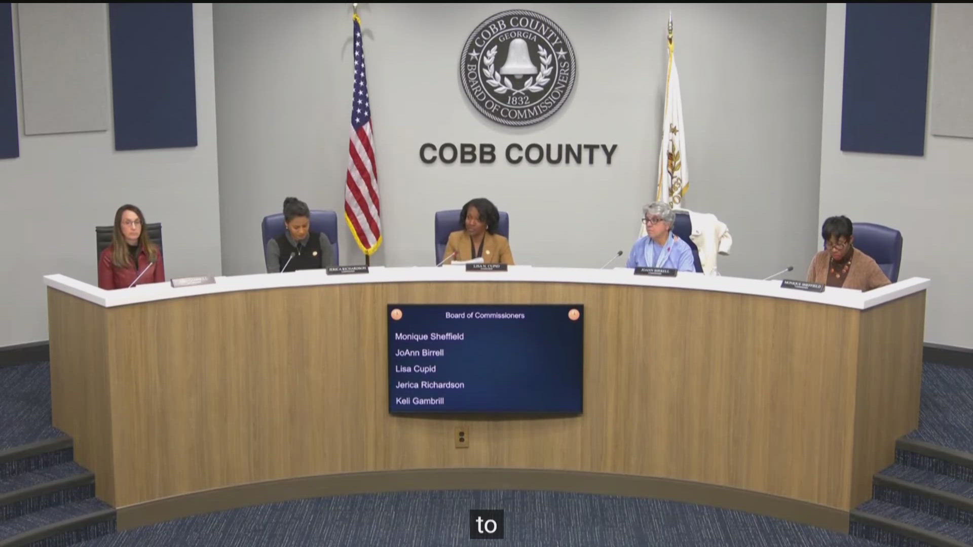 Cobb County will postpone a county commission election after a judge ruled the county illegally drew district lines for seats due to be on the ballot.